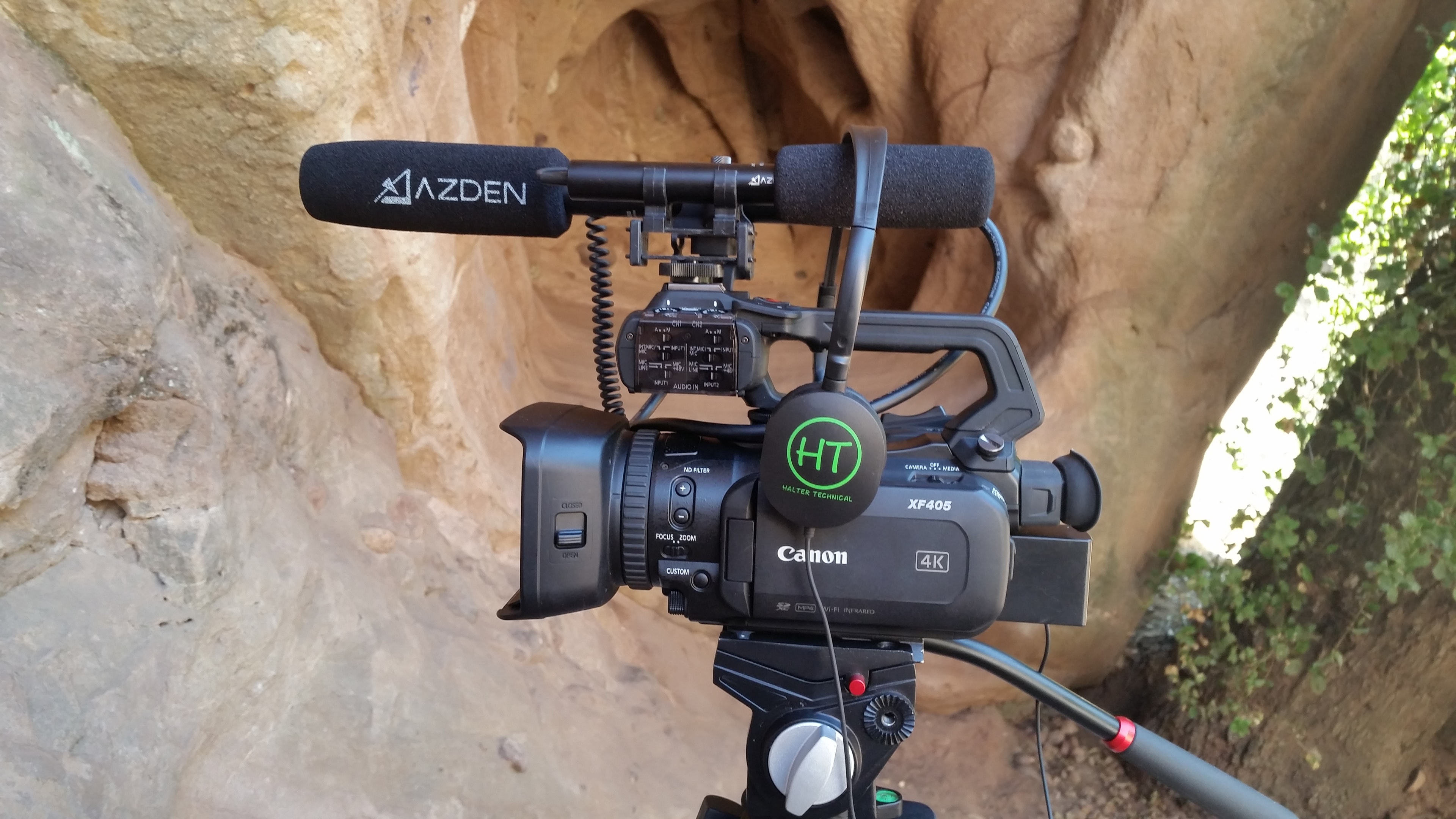 Canon XF405 4K camera on tripod with Azden microphone